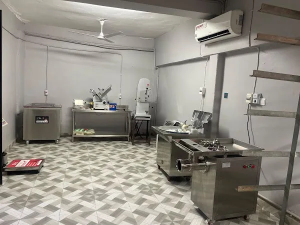 Clean food-processing workspace at MeatLand Santasi