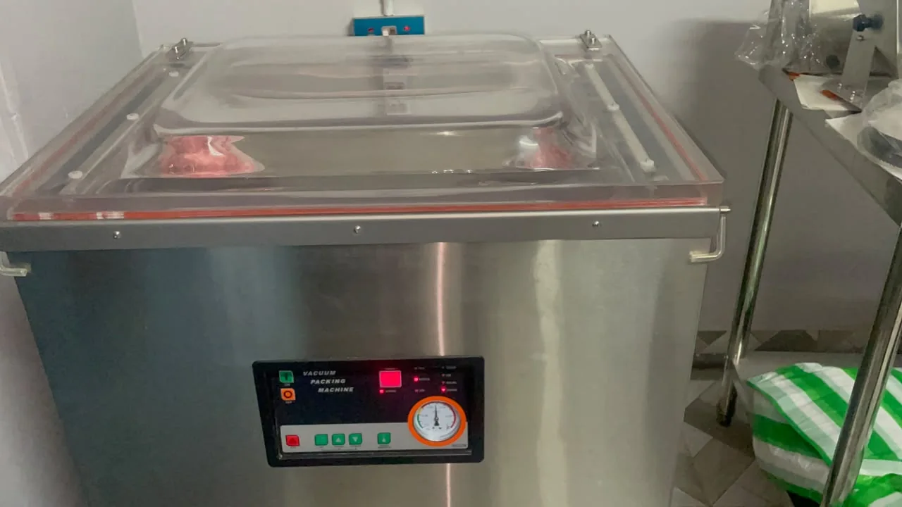 A food product being vacuum packaged at MeatLand